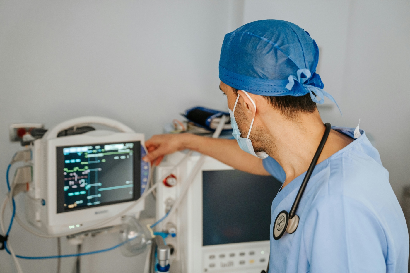 Clinician reviewing medical monitors