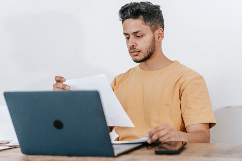 Person reading their reply by email