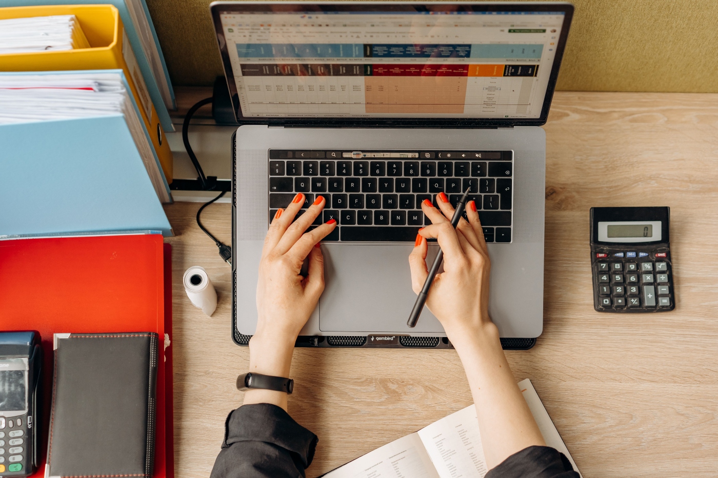 Person uploading medical records on laptop